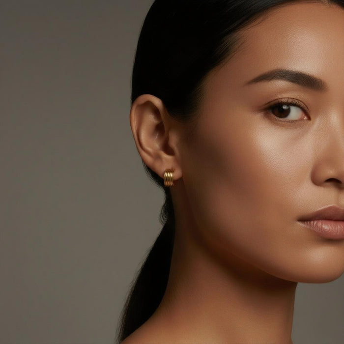 Rhea – Ribbed Gold Huggies